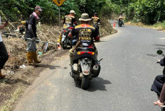 Komunitas Kompas Ranau Bersatu Bersihkan Jalan Lintas